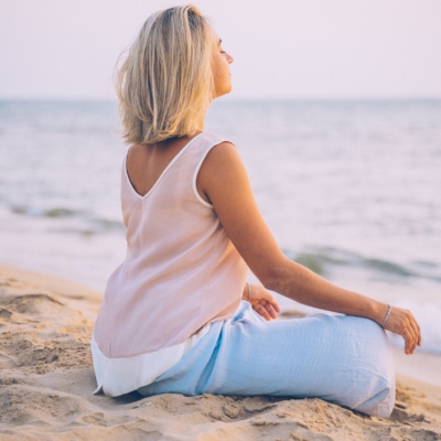 woman relaxing at the beach Teaching Methods