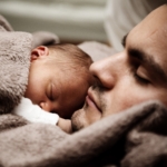 man with baby